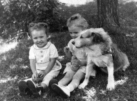Two girls and a dog